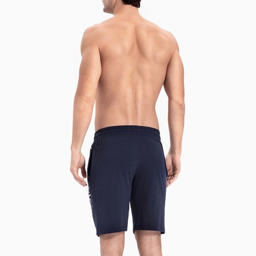 Calvin Klein Short קלווין קליין שורט קצר בצבע כחול כהה - www.bbrands.co.il Calvin Klein Short קלווין קליין שורט קצר בצבע כחול כהה